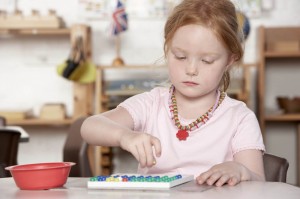 Young Boy Playing at Montessori/Pre-School